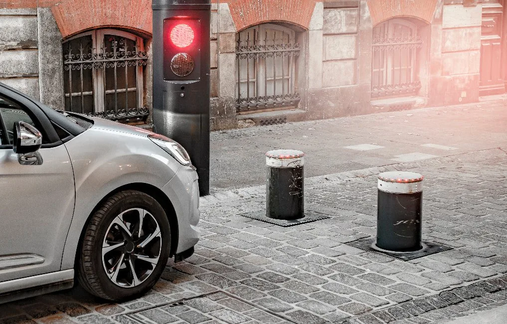 car stopped at bollard